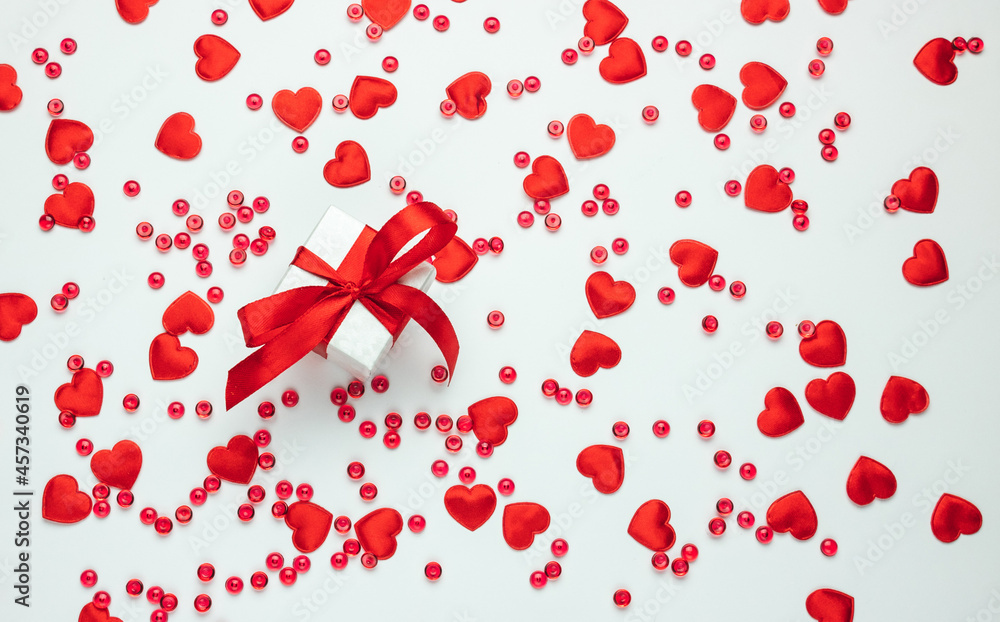 Small gift or engagement ring box with decorative red hearts. For Valentine's Day, Mother's Day, birthday, anniversary or wedding. Small gift or engagement ring box with decorative red hearts. For Valentine's Day, Mother's Day, birthday, anniversary or wedding.