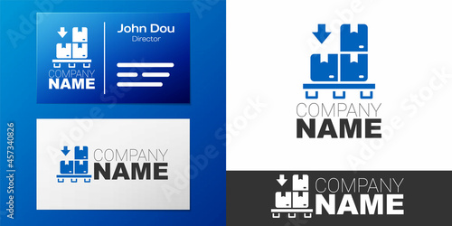 Logotype Cardboard boxes on pallet icon isolated on white background. Closed carton delivery packaging box with fragile signs. Logo design template element. Vector