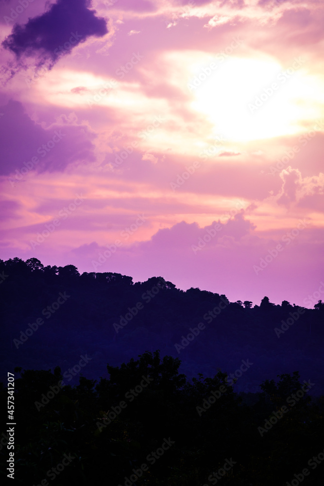 silhouette mountain with attractive background, sunset with vivid purple sky
