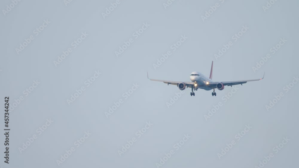 Passenger airliner in flight Passenger airliner in flight