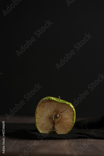 Wilted half of green apple