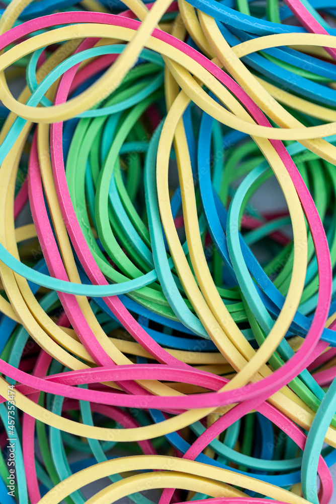 colorful rubber bands (yellow, green, red, blue, pink) colorful rubber bands (yellow, green, red, blue, pink)