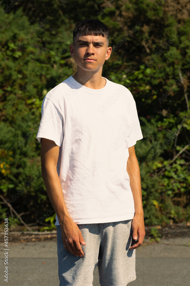 18 year old walking outdoors on a summer day 18 year old walking outdoors on a summer day