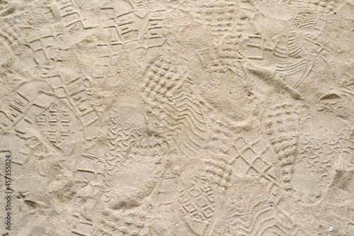 Fototapeta Naklejka Na Ścianę i Meble -  various footprints on the sand