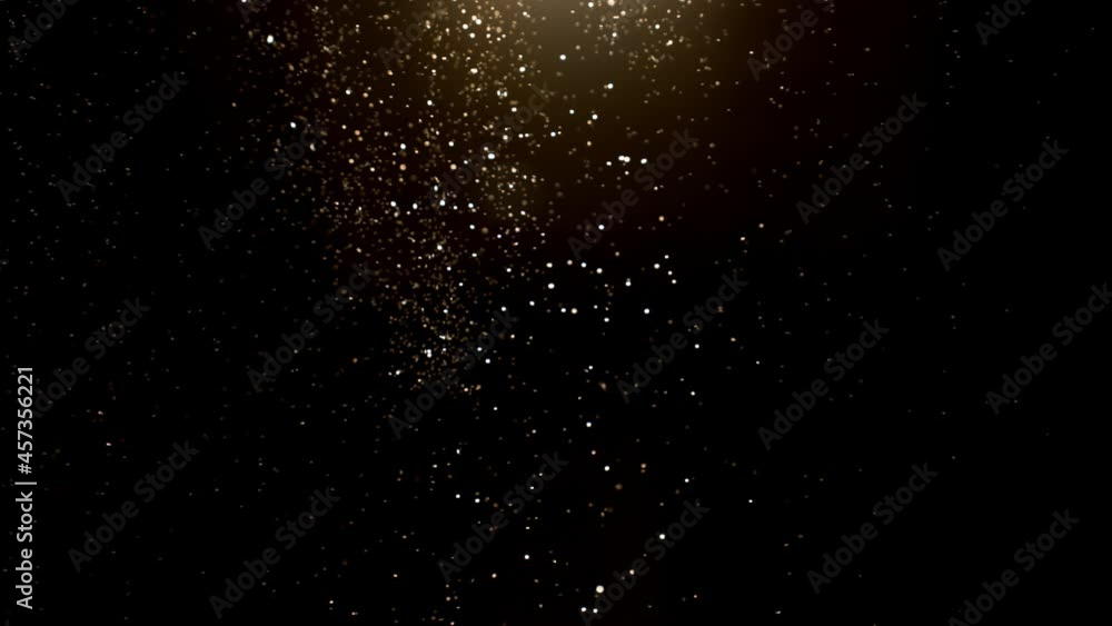 Super slow motion of abstract gold particles on black background. Filmed on high speed cinematic camera at 1000 frames per second.