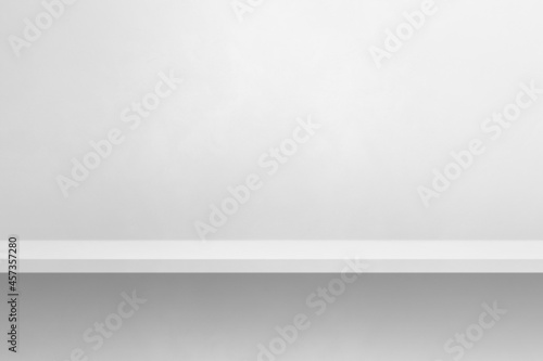 Empty shelf on a white wall. Background template. Horizontal backdrop
