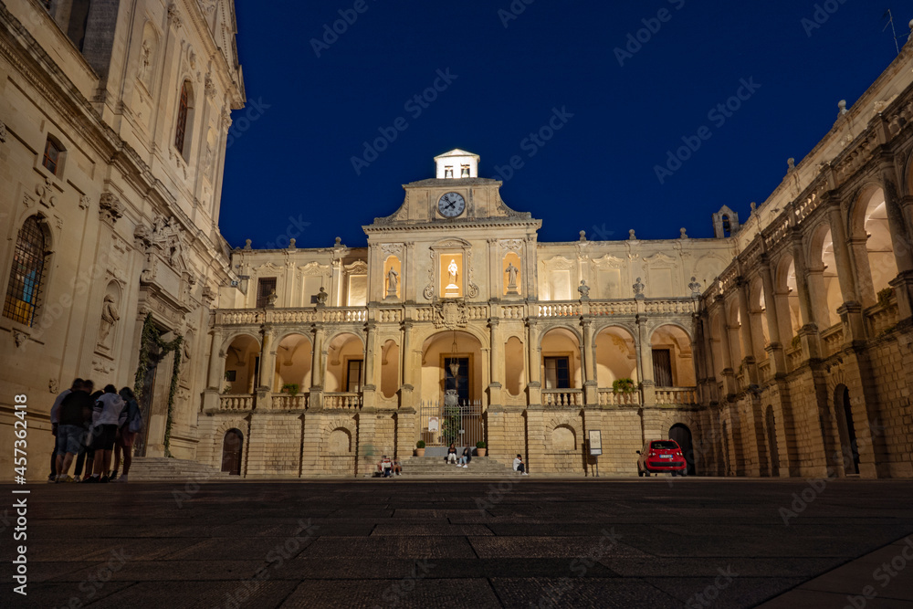 Lecce, walking down the old town by night in summer