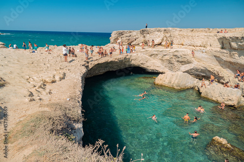 Melendugno (Puglia, Italy). August 2019. Swimming in the Grotta della Poesia (Poetry cave)