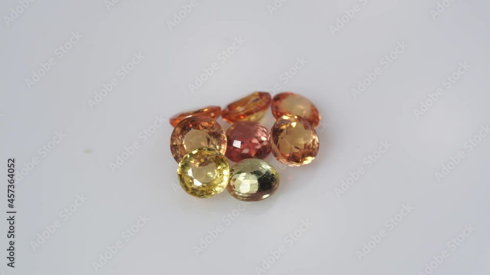 multi color natural sapphire on the white turning table multi color natural sapphire on the white turning table