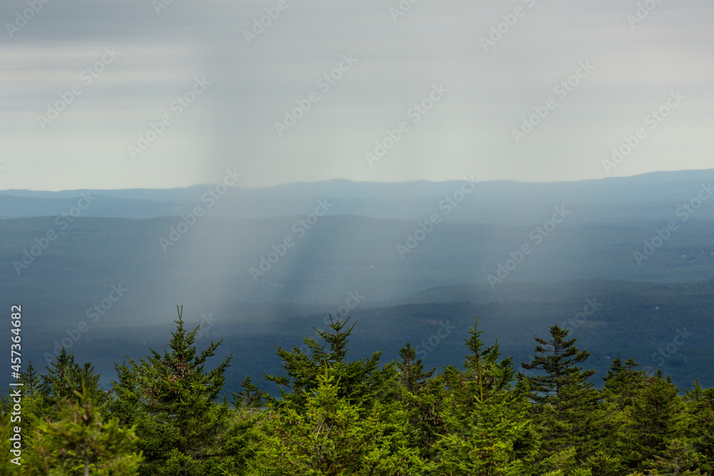 Rain shower in the valley, seen from Mt. Kearsarge summit.