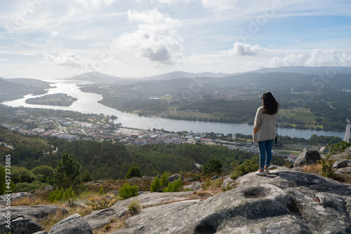 Caucasian woman seen from a viewpoint, Vila Nova de Cerveira Portugal photo