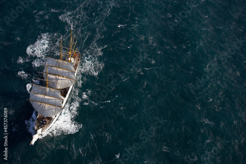 big sail boat leaving the bay of Reykjavik for the North Atlantic