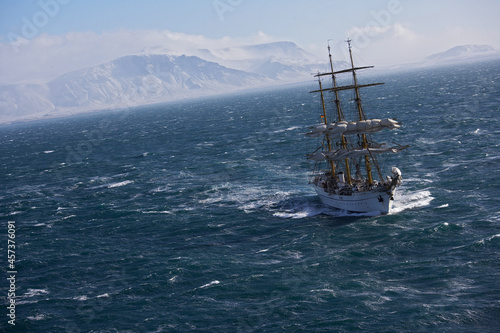 big sail boat leaving the bay of Reykjavik for the North Atlantic