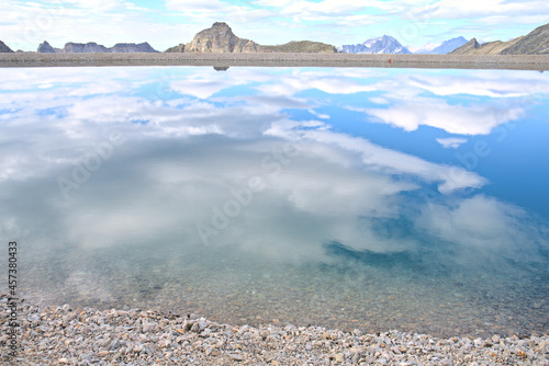 Hiking in Mölltaler Glacier area, high mountains, glacier, waterdams and cows on pastures  photo