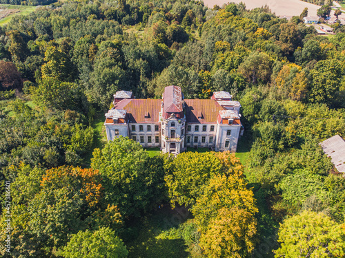 View of the old ruined palace of the Chetvertinsky family in the village of Zheludok, Belarus. Drone aerial photo