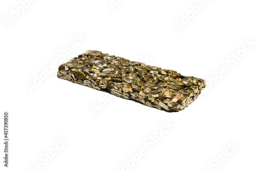 Bar with nuts isolated on a white background. Pumpkin seeds bar.