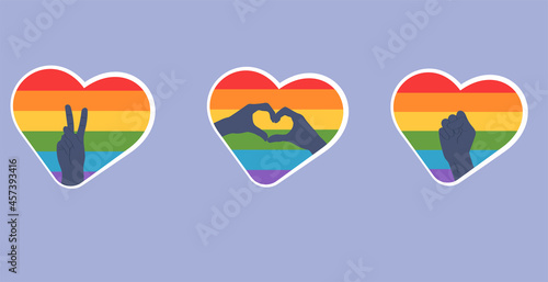 Heart-shaped stickers with LGBT flag with hands meaning victory  peace  love and fight for rights.