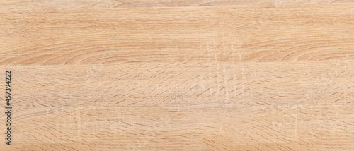 Beige rough wooden texture background. Table top view