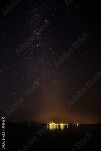 sky full of stars over a lake