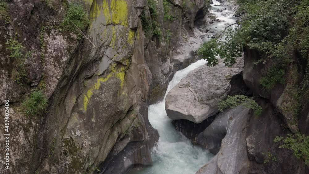Passer river cascading in gorge between rocks, 4k footage Passer river cascading in gorge between rocks, 4k footage