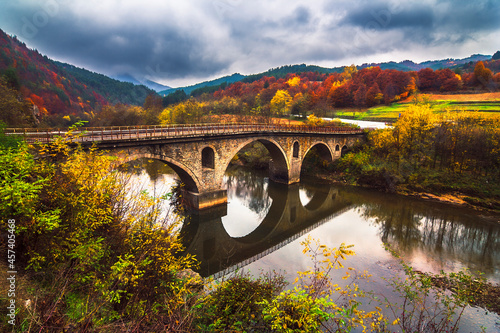 Bridge over Arda river in Rhodope Mountains at autumn photo