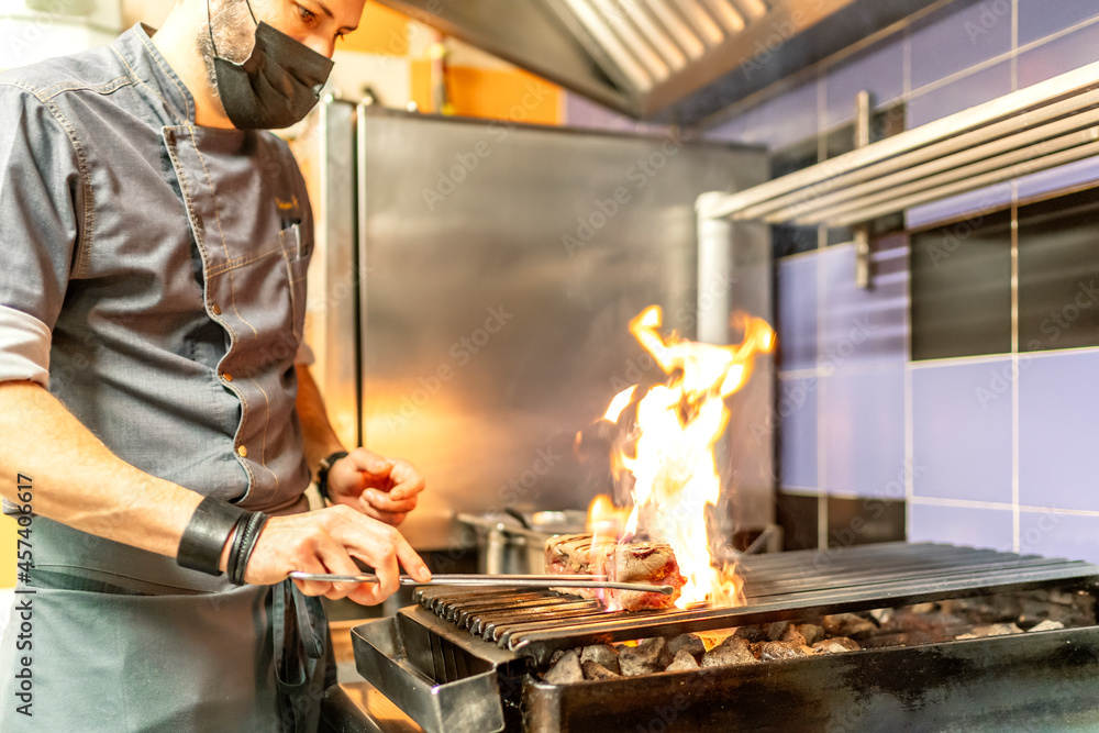 fabulous kitchen chef preparing grilled meat fabulous kitchen chef preparing grilled meat