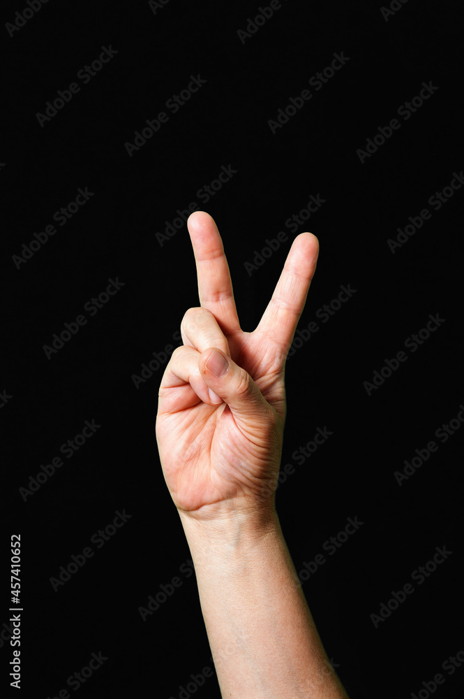 International sign for peace and love on black background International sign for peace and love on black background