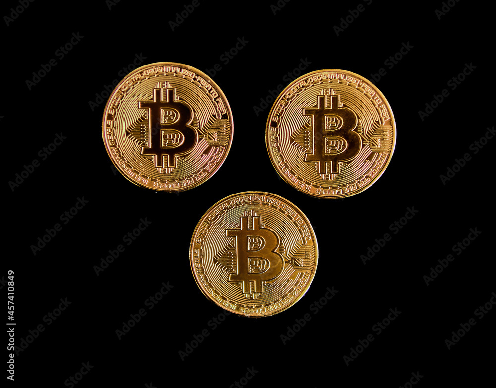 Bitcoin coins on a black background. Concept of power, economics, power, money, Btc, anonymity. Bitcoin coins on a black background. Concept of power, economics, power, money, Btc, anonymity.