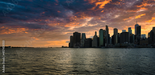 city skyline at sunset beautiful place cute New York clouds sea panora photo