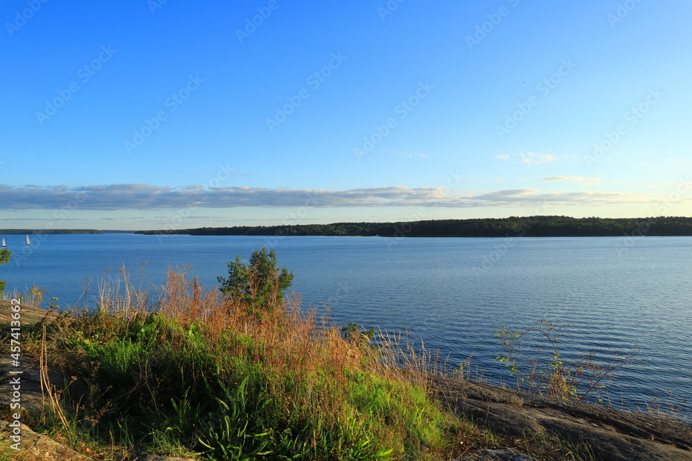 Beautiful view over a Scandinavian landscape. At the lake called Malaren or Mälaren. Month of September, late summer. Copy space for extra text. Stockholm, Sweden, Europe.