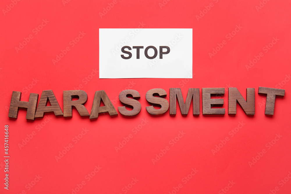 Text STOP HARASSMENT on color background Text STOP HARASSMENT on color background