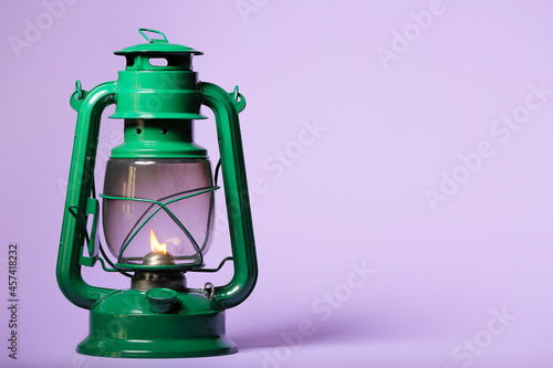 Stylish retro lamp on color...