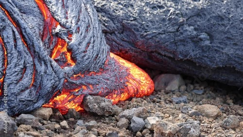 Lava flowing from active volcano in Iceland photo