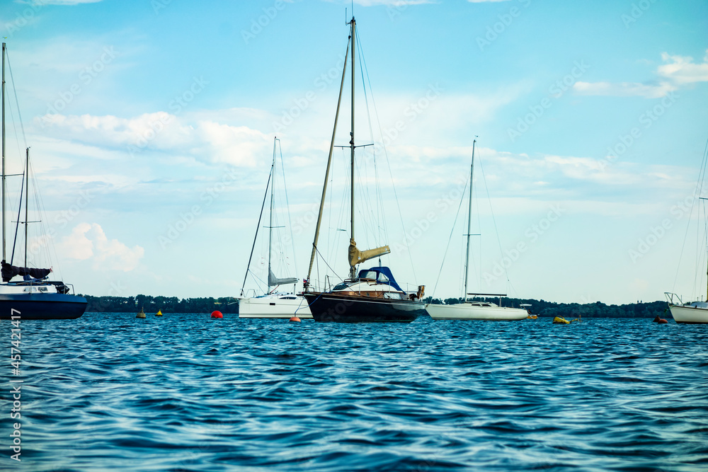 Sailboat moored in the harbor for boats, yachts and sailboats in a recreational destination Sailboat moored in the harbor for boats, yachts and sailboats in a recreational destination