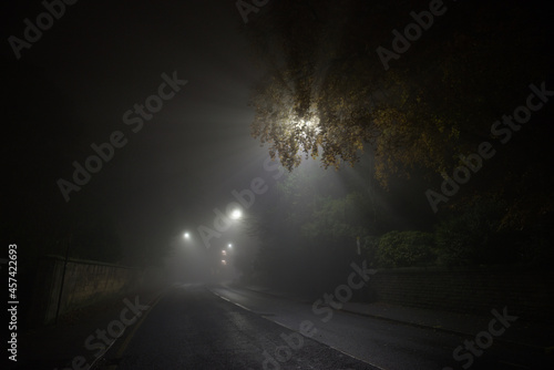 Deserted and spooky glossop road in sheffield, heavy fog during night