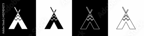 Set Traditional indian teepee or wigwam icon isolated on black and white background. Indian tent. Vector photo