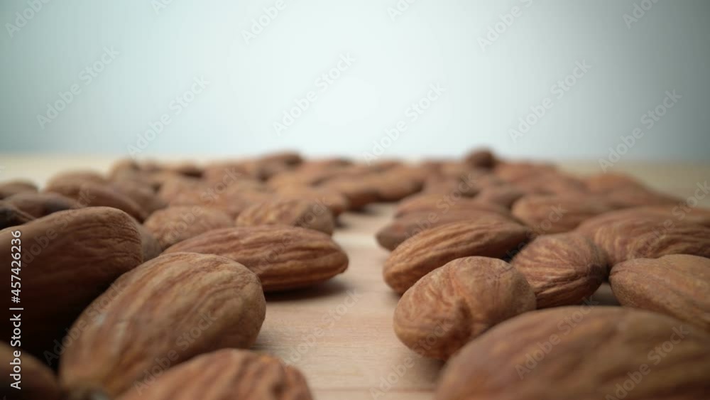 Extreme macro, bottom movement of almond kernels, for vegetarians and nutritious food. Biologically pure. Extreme macro, bottom movement of almond kernels, for vegetarians and nutritious food. Biologically pure.
