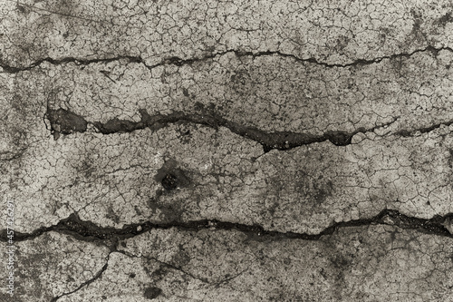 cement texture with elongated streaks and stain