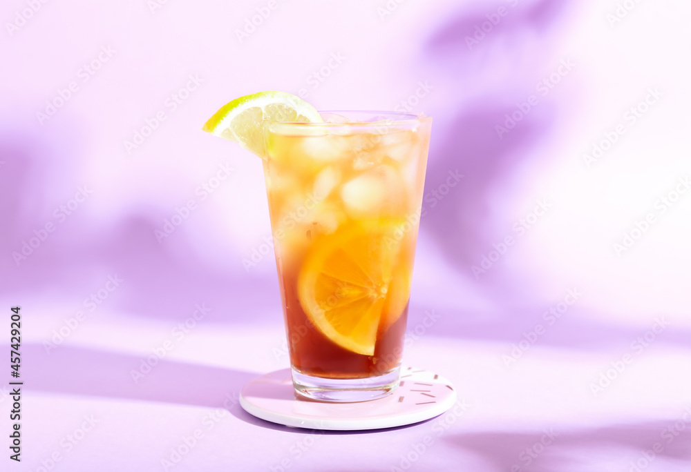 Glass of tasty Long Island iced tea on color background Glass of tasty Long Island iced tea on color background