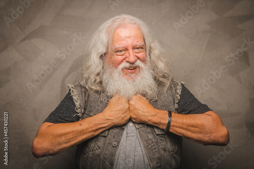 Grizzled Old Rogue with Long Gray Hair and White Beard Clowns for the Camera photo