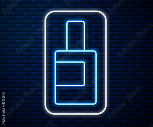 Glowing neon line Plastic bottle for laundry detergent, bleach, dishwashing liquid or another cleaning agent icon isolated on brick wall background. Vector