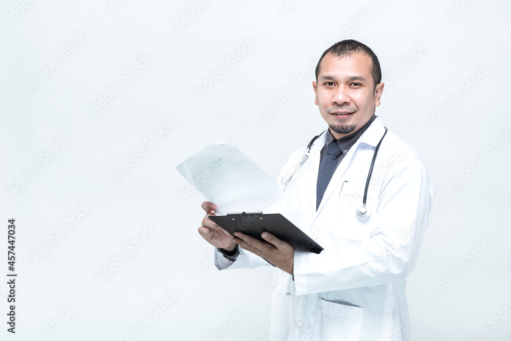 Portrait of cheerful smiling man doctor with stethoscope holding document folder on white background. Portrait of cheerful smiling man doctor with stethoscope holding document folder on white background.