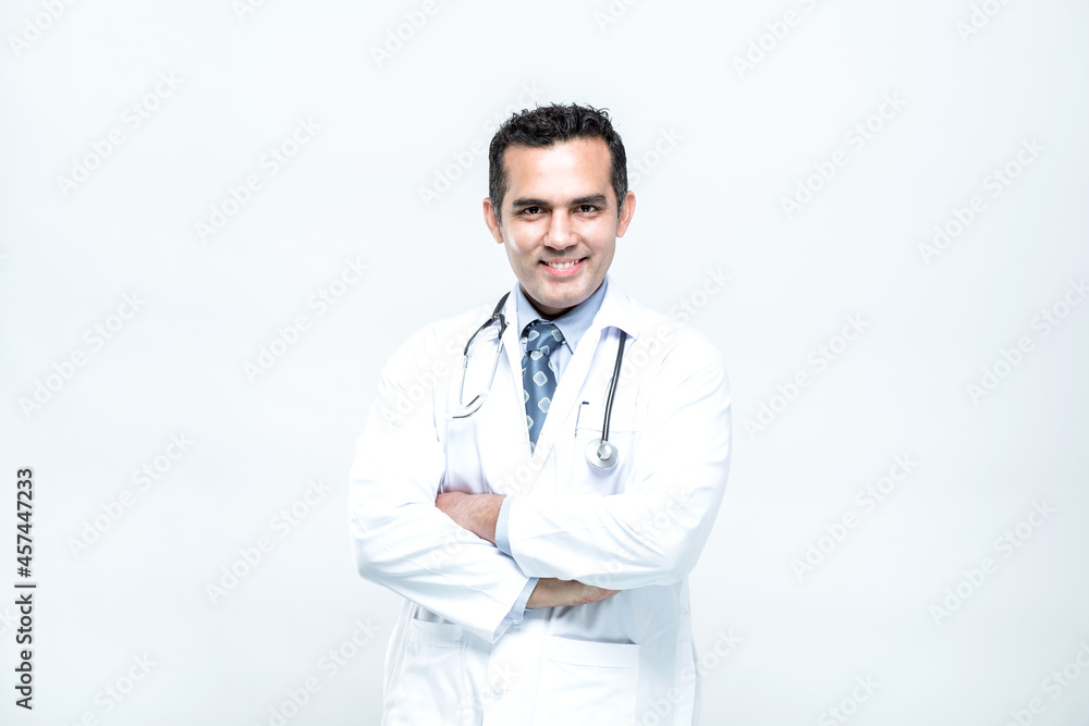 Portrait of cheerful smiling man doctor with arms crossed on white background. Portrait of cheerful smiling man doctor with arms crossed on white background.