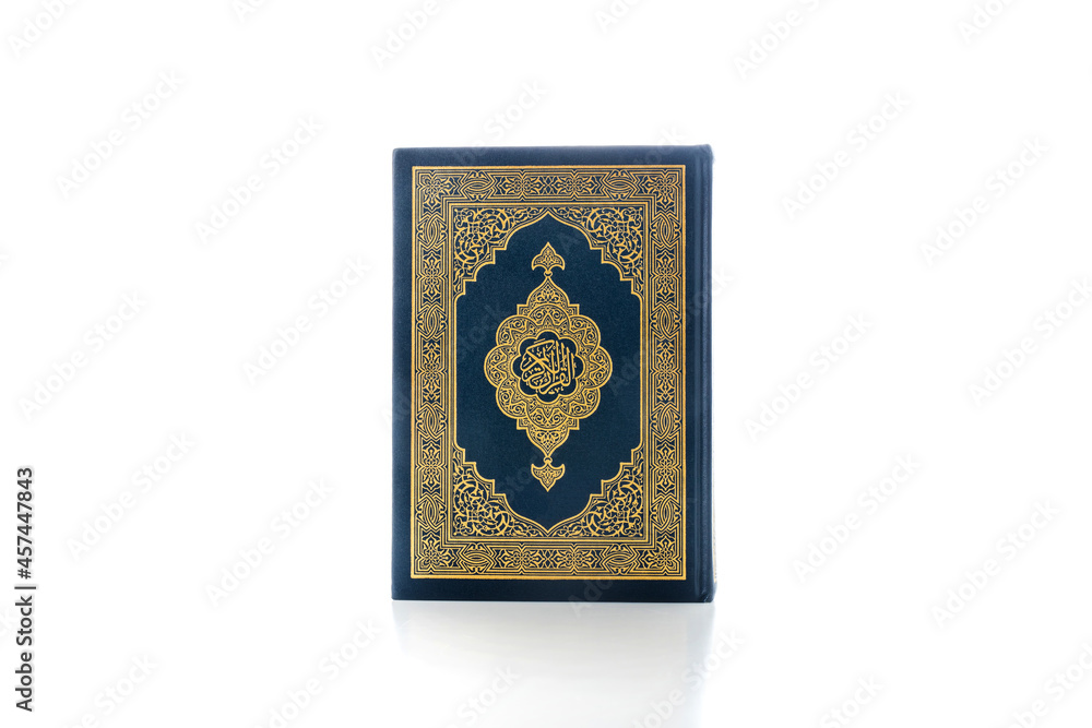 Islamic concept - The Holy Al Quran with written Arabic calligraphy meaning of Al Quran, Arabic word translation: The Holy Al Quran (holy book of Muslim), on white background, with copy space. Islamic concept - The Holy Al Quran with written Arabic calligraphy meaning of Al Quran, Arabic word translation: The Holy Al Quran (holy book of Muslim), on white background, with copy space.