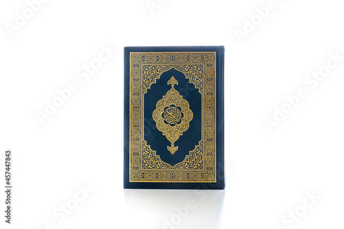 Islamic concept - The Holy Al Quran with written Arabic calligraphy meaning of Al Quran, Arabic word translation: The Holy Al Quran (holy book of Muslim), on white background, with copy space.
