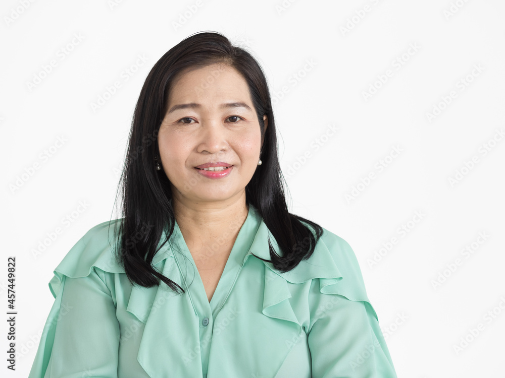 Portrait of middle aged Asian woman wearing mint green blouse looking neat smiling beautifully with confident isolated Portrait of middle aged Asian woman wearing mint green blouse looking neat smiling beautifully with confident isolated