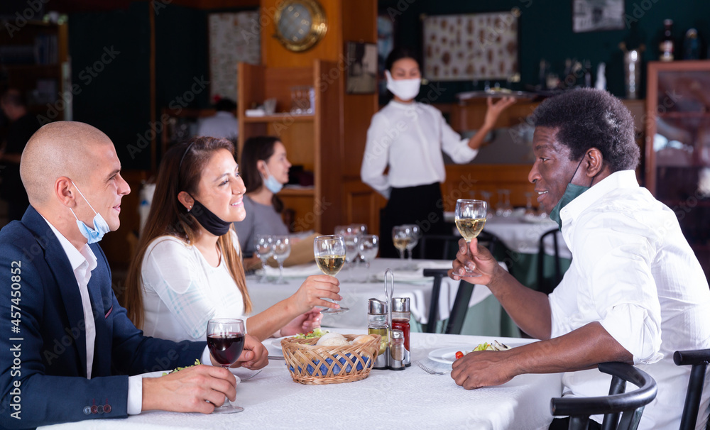 positive clients eating and drinking in cafe during quarantine
