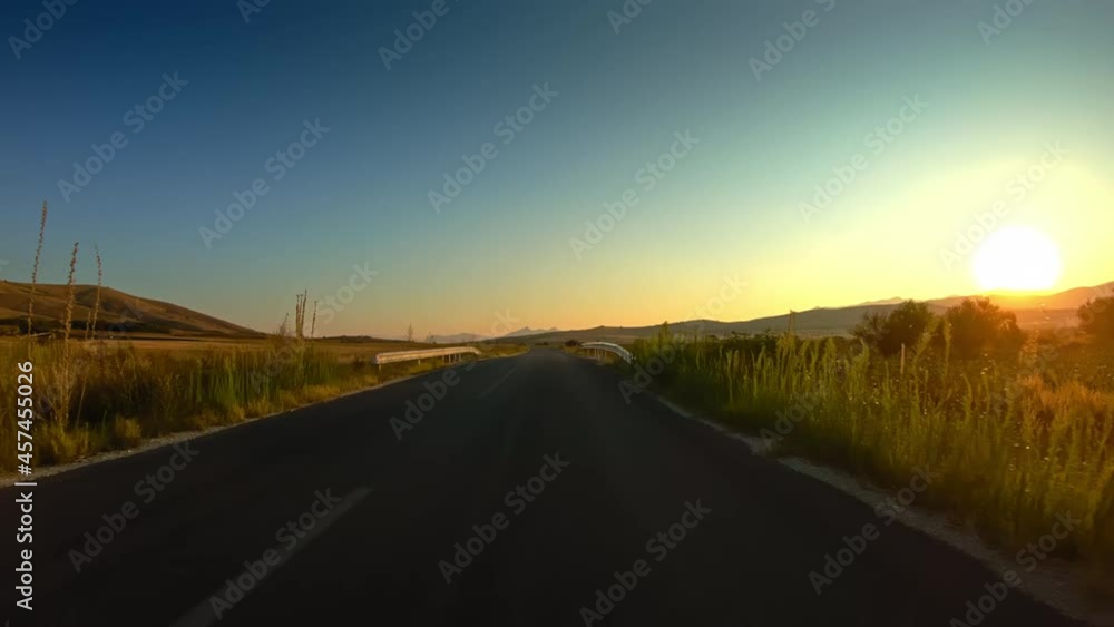 Beautiful countryside nature, morning ride, golden fields, summer, POV driving
