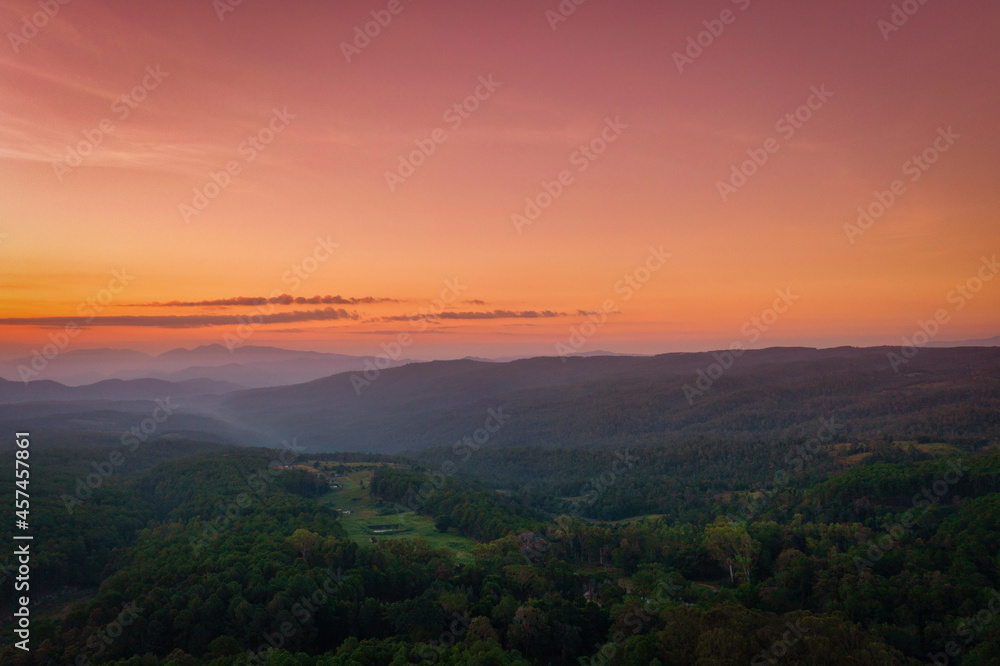 Aerial view of sunrise over mountian and pine tree in Chiang Mai Province, Thailand. Aerial view of sunrise over mountian and pine tree in Chiang Mai Province, Thailand.