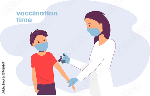 A doctor in a mask vaccinates a child, a boy from covid-19, the boy will be healthy, vaccination time
